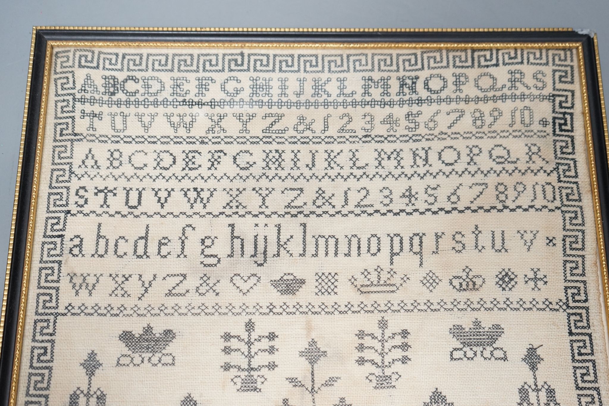 A framed Victorian alphabet sampler by Sarah Ann Seaton Welford, aged 13, 32x33cm